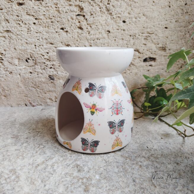 Brûleur à parfum Floral Bug, motif floral et insectes colorés, diffuseur d'huiles essentielles ou fondants de cire pour une ambiance sensorielle et botanique.