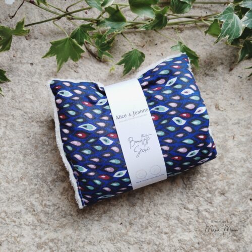bouillotte sèche Louna artisanale motif gouttes multicolores bleu roi graines de lin